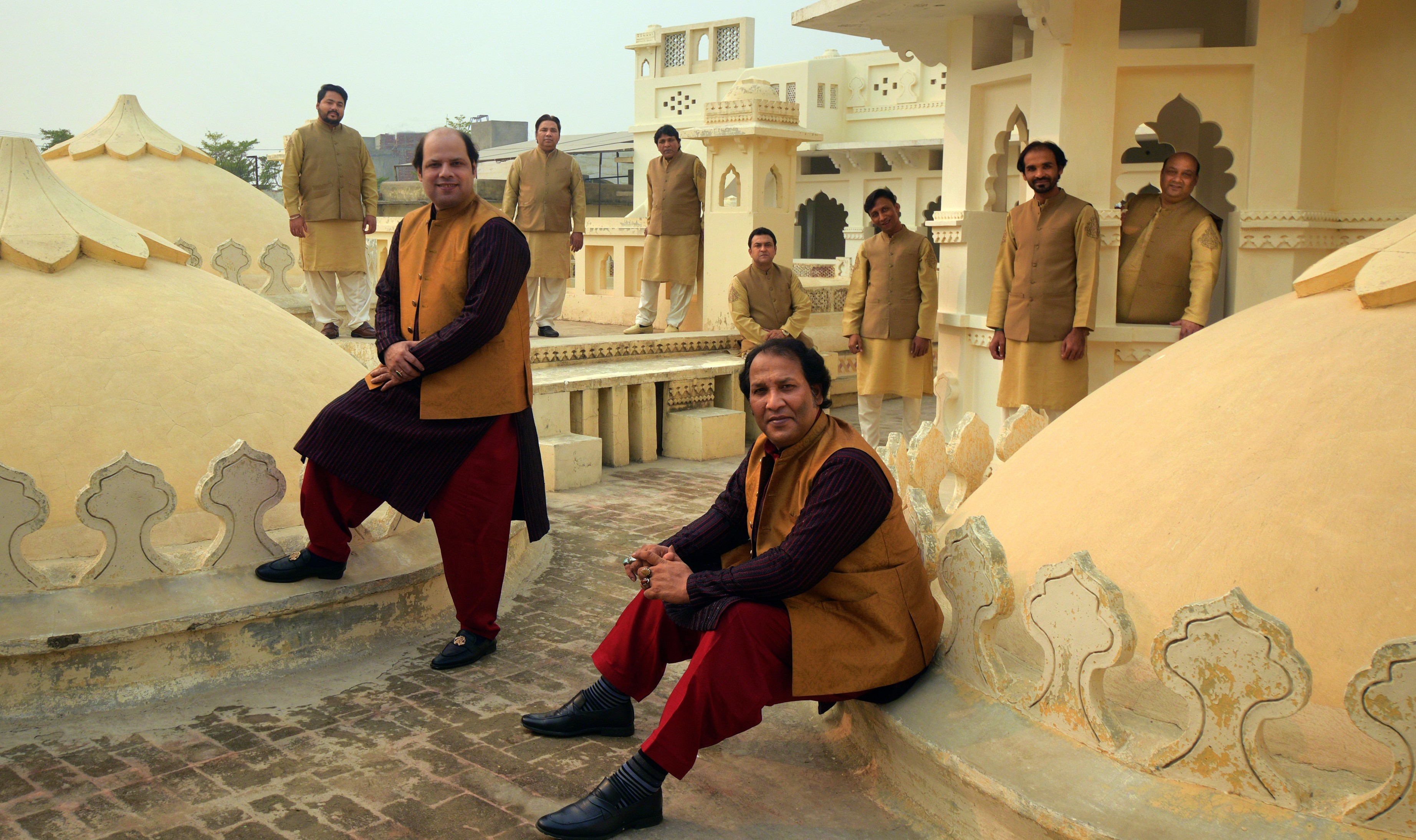 The Rizwan-Muazzam Qawwali Ensemble photographed on a rooftop